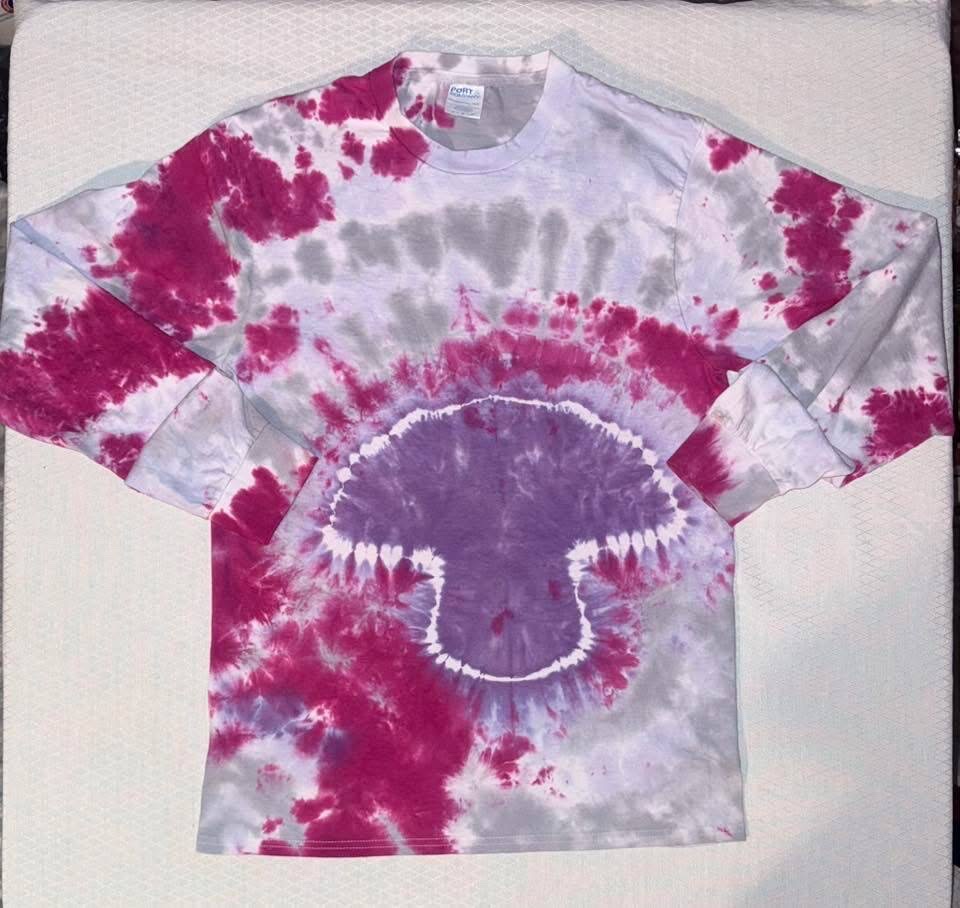 Tie-dye shirt with a purple mushroom design