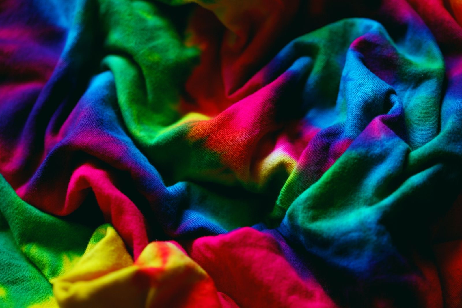 Close-up of vibrant rainbow tie-dye fabric