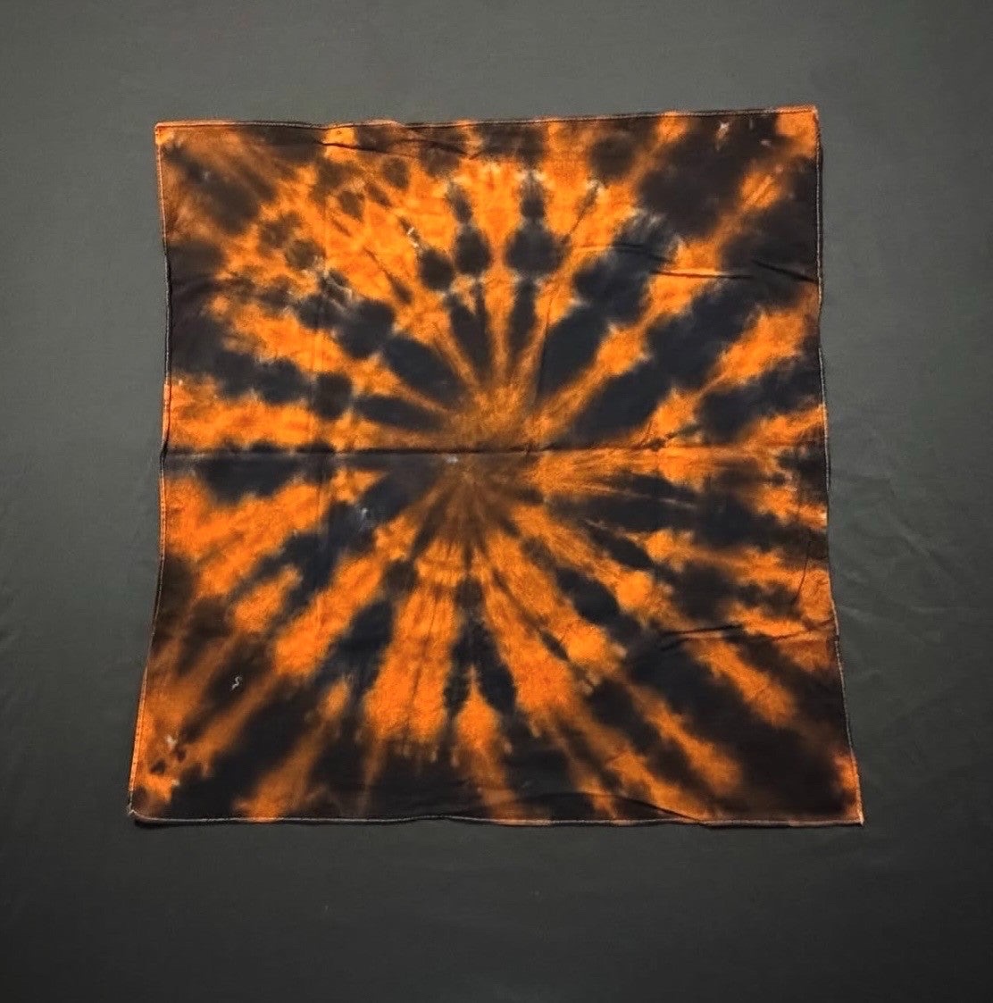 Orange and black burst tie-dye bandana