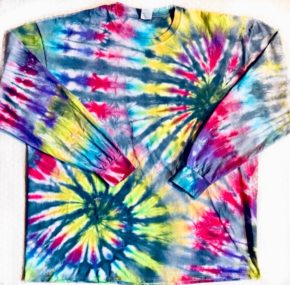Rainbow spiral tie-dye long sleeve shirt with spirals on the sleeves